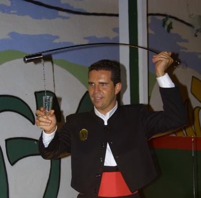 Skillfully dispensing the sherry