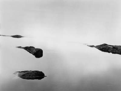 Still water and rocks