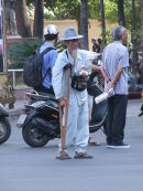Vietnamese Old Man Selling Lottery Tickets