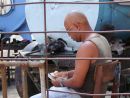 Water Seller counting his takings!, Havana