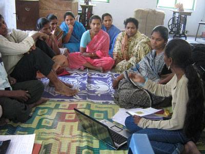 T. Mary Rani demostrating The Fair Wage Guide in Bethany Leprosy Colony