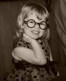Little girl in glasses