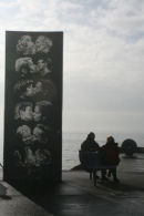 Couple next to the Kiss Wall, Brighton