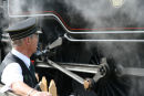 Steam train inspector smoking a pipe