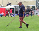Fence Judge Chris Trim retrieves another horse shoe