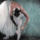 Dancer tying pointe shoes