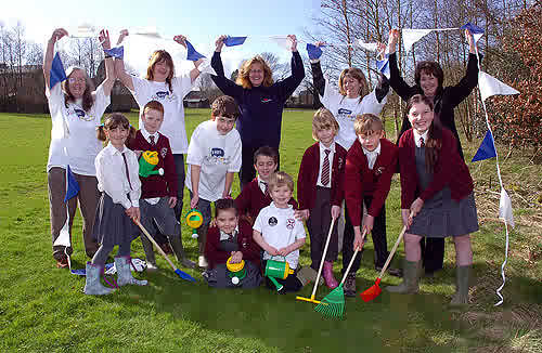 Pupils and staff of Four Marks Primary School,Hampshire start the Wildlife Pond project in the school garden. RBS Insurance PR - March 07