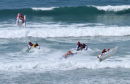 ZapCat racers fly the Watergate surf.