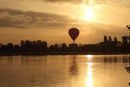 02D-5637 Hot Air Balloon Flying Over the Town of Les Rosiers Sur Loire Just After Sunrise With the Loire River in the Foreground France