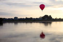 02D-5667 Hot Air Balloon Flying Over the Town of Les Rosiers Sur Loire Just After Sunrise With the Loire River in the Foreground France