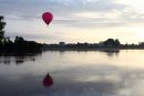02D-5682 Hot Air Balloon Flying Over the Town of Les Rosiers Sur Loire Just After Sunrise With the Loire River in the Foreground France