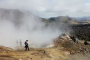 03D-4848 Hikers Walking through Clouds of Steam and Sulphur Gas from a Geothermal Volcanic Vent on the Laugavegur Hiking Trail Landmannalaugar Fjallabak Iceland.