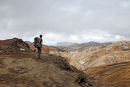 03D-5052 Trekker Enjoying the View Over the Colourful Ryolite Mountains on Day 2 of the Laugavegur Hiking Trail from Landmannalaugar to Thorsmork Fjallabak Area of Iceland