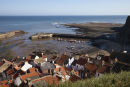 05D-5550 The Small Fishing Village of Staithes and its Harbour at Low Tide North Yorkshire UK.
