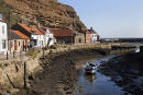 05D-5575 The Small Fishing Village of Staithes and its Harbour at Low Tide North Yorkshire UK.