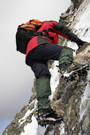 06-2465 Hill Walker Scrambling on Cruach Ardrain in Winter, Scotland