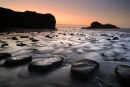 Chapel Rock sea stack and coastline at Perranporth, Cornwall
