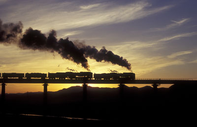 Double-headed QJ freight departure from Reshui in China September 2005.
