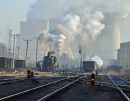 departure with the Fuxin powerplant in the background.