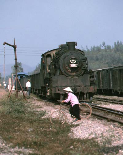 GP6 class 2-8-2 1040 with 10 bogie loaded coal wagons between Kep and Hanoi Yen  Vien.