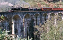 No 340 and No 213 cross a viaduct.