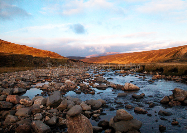 Crossing the river Dulnain in the late evening.