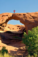 Our Navajo guide, Wayne, again provides a perfect addition to my photograph of another hole in the rocks.