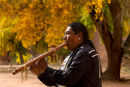 A Navajo musician, Travis Terry, in Canyon De Chelly