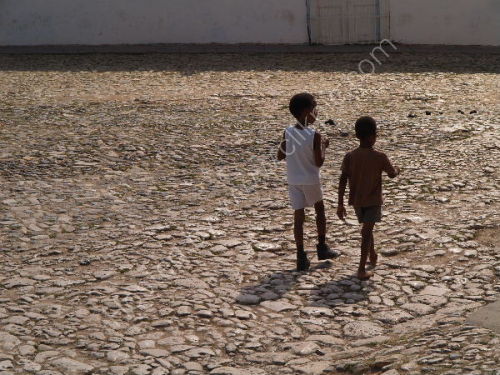 Children in cobbled square, Trinidad