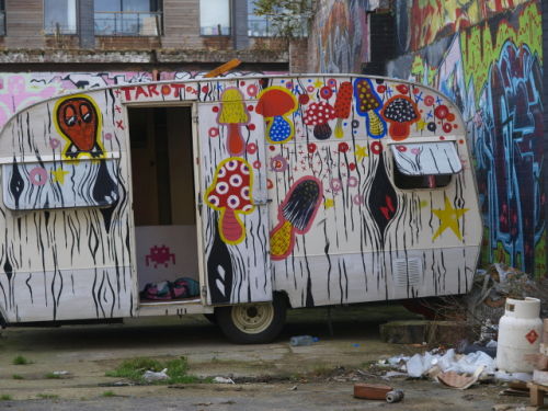 Caravan with graffiti