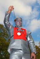 Man dressed as the Tin Man from the film Wizard of OZ playing conkers at the World Conker Championships