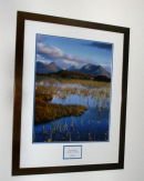 An limited edition print that has been mounted and framed