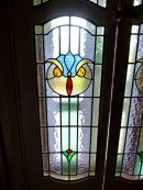 Badly damaged double front doors 
