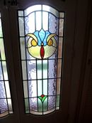 Badly damaged double front doors.