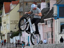 Balancing young biker, Lyme Regis sea front