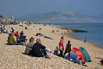 Relaxing on Lyme Regis beach