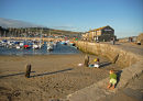 Lyme Regis harbour with boy
