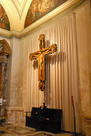 Nun waiting in cathedral in Valetta, Malta