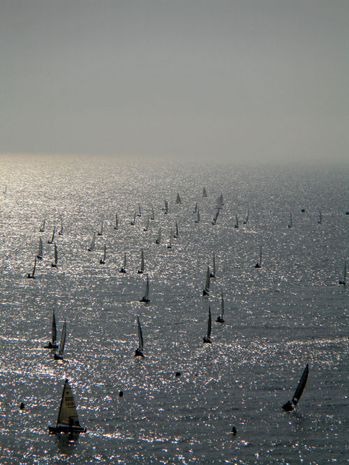 Sailing regatta on a sunlit sea