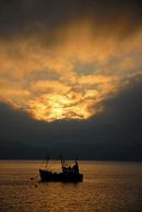 Sunrise with fishing boat