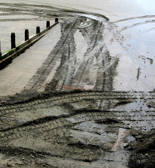 Tracks on the beach at Lyme Regis