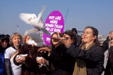 Dr Helen Pankhurst releases a dove