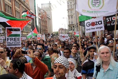 Demonstrators get as close as they can to the Israeli Embassy