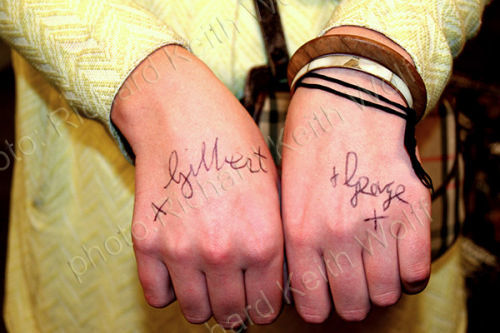 Gilbert & George�s signatures on a ladies hand arguable making the lady a living sculpture 