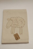 Baby's 100% organic lambs wool blanket. 
Size 59 in. x 39 in. (1,50cm x 1,00m). 
Colour: Ivory. 
Price: �35

Wholesale available.