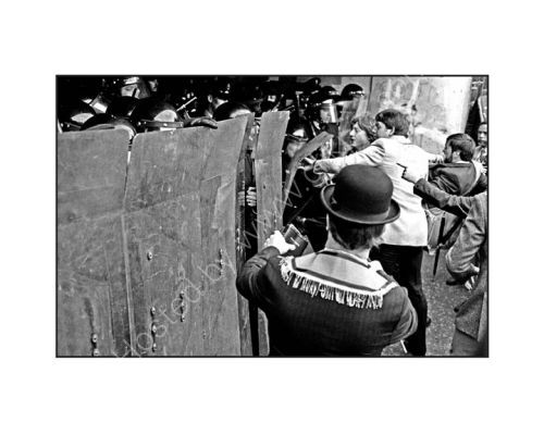 Protestors attack a line of RUC officers at 