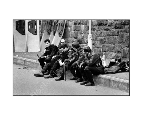 Exhausted RUC officers take a break  