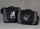 This picture shows two bags that I have designed for a customer, a Rhinestone design  on the left and the other has a vinyl design.  Both bags are conference bags of 11ltr capacity with a flap that is secured by two velcro tabs.  I can also supply another style of bag which is opened by a zip at the top which is also a 11ltr capacity.  I have diferent colours in both styles.