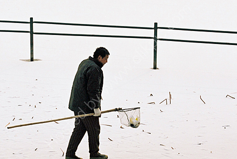 Frozen Lake and Chinese Worker.