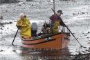 pushing the catch ashore